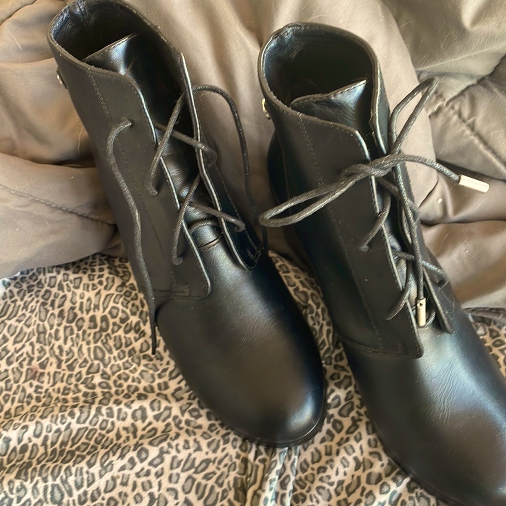 Black leather wedge boots